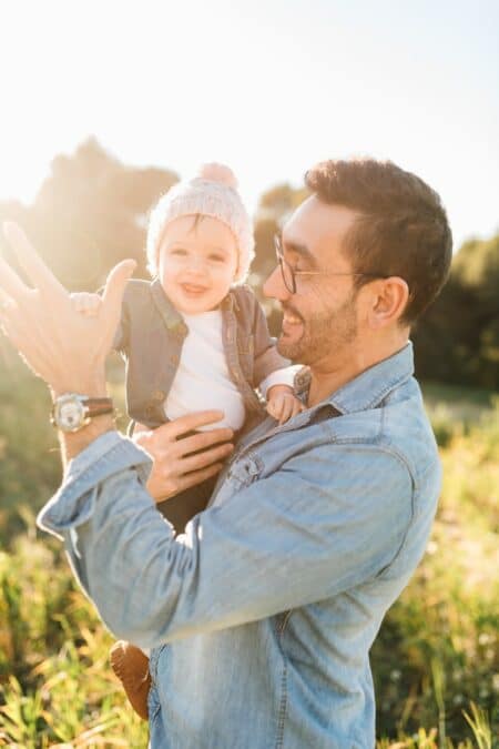 At what age does the baby recognise his father?